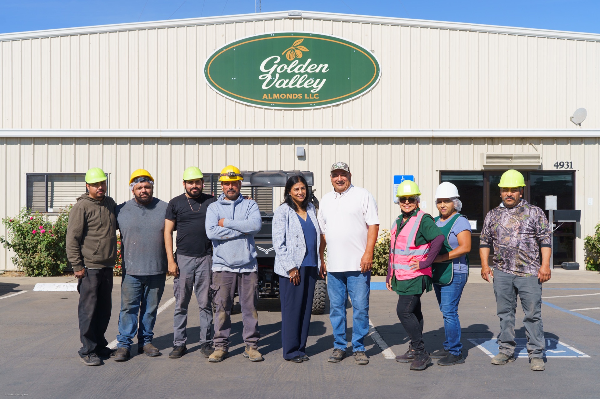 Golden Valley Almonds team standing together outside the Denair facility